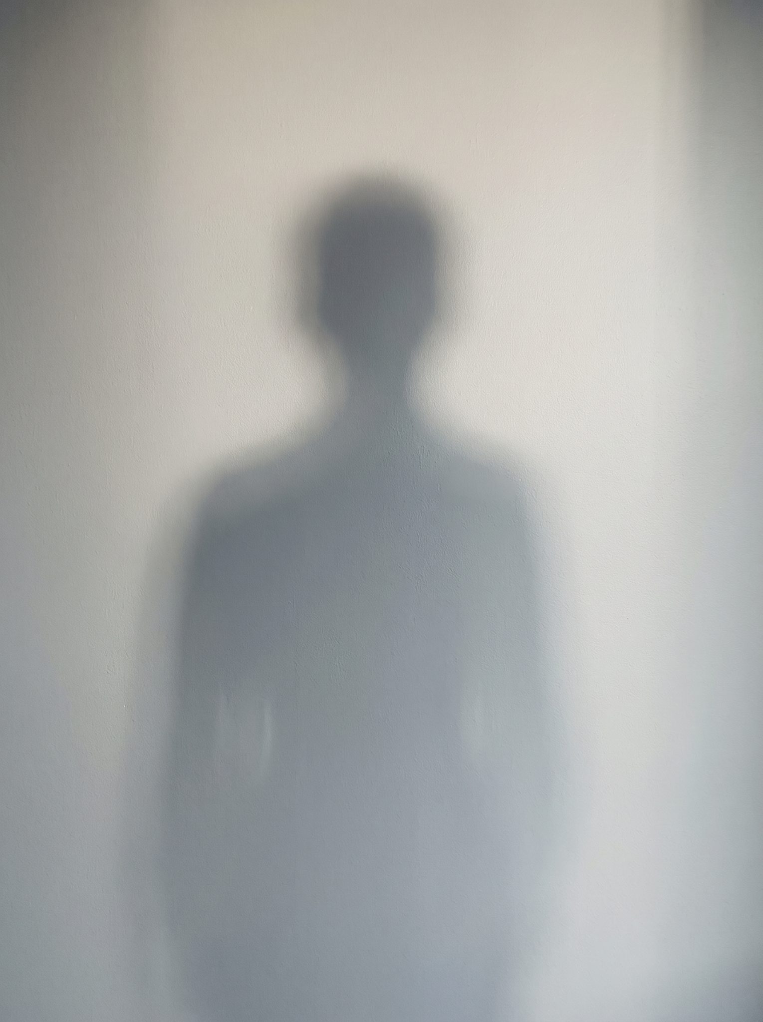 An anonymous human shadow with no visible age or gender